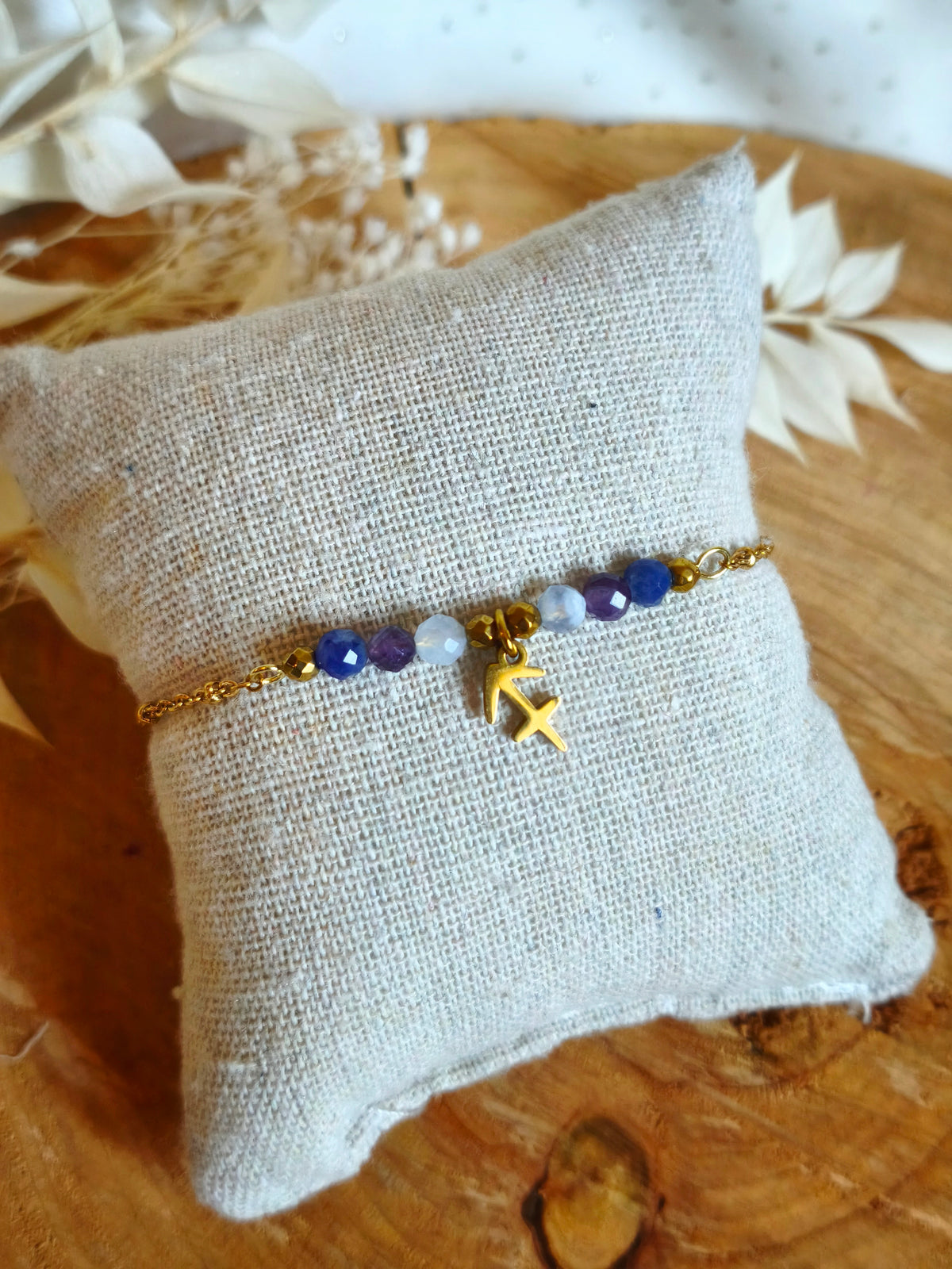Joli bracelet en acier inoxydable sur le thème des signes astrologiques avec le signe du Sagittaire