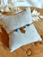 Joli bracelet en acier inoxydable sur le thème des signes astrologiques avec le signe de la Vierge et ses pierres naturelles