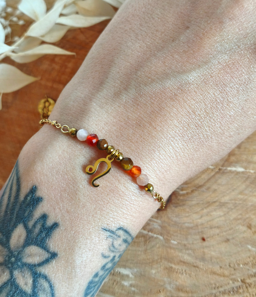 Cracker pour ce joli bracelet du signe du lion avec ses jolies pierres fines de cornaline œil de tigre et fier de soleil
