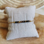 Bracelet en oeil de tigre , sur chaine en acier inoxydable 