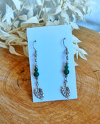 Paire de boucles d'oreilles en acier inoxydable argenté avec la perle naturelle de malachite