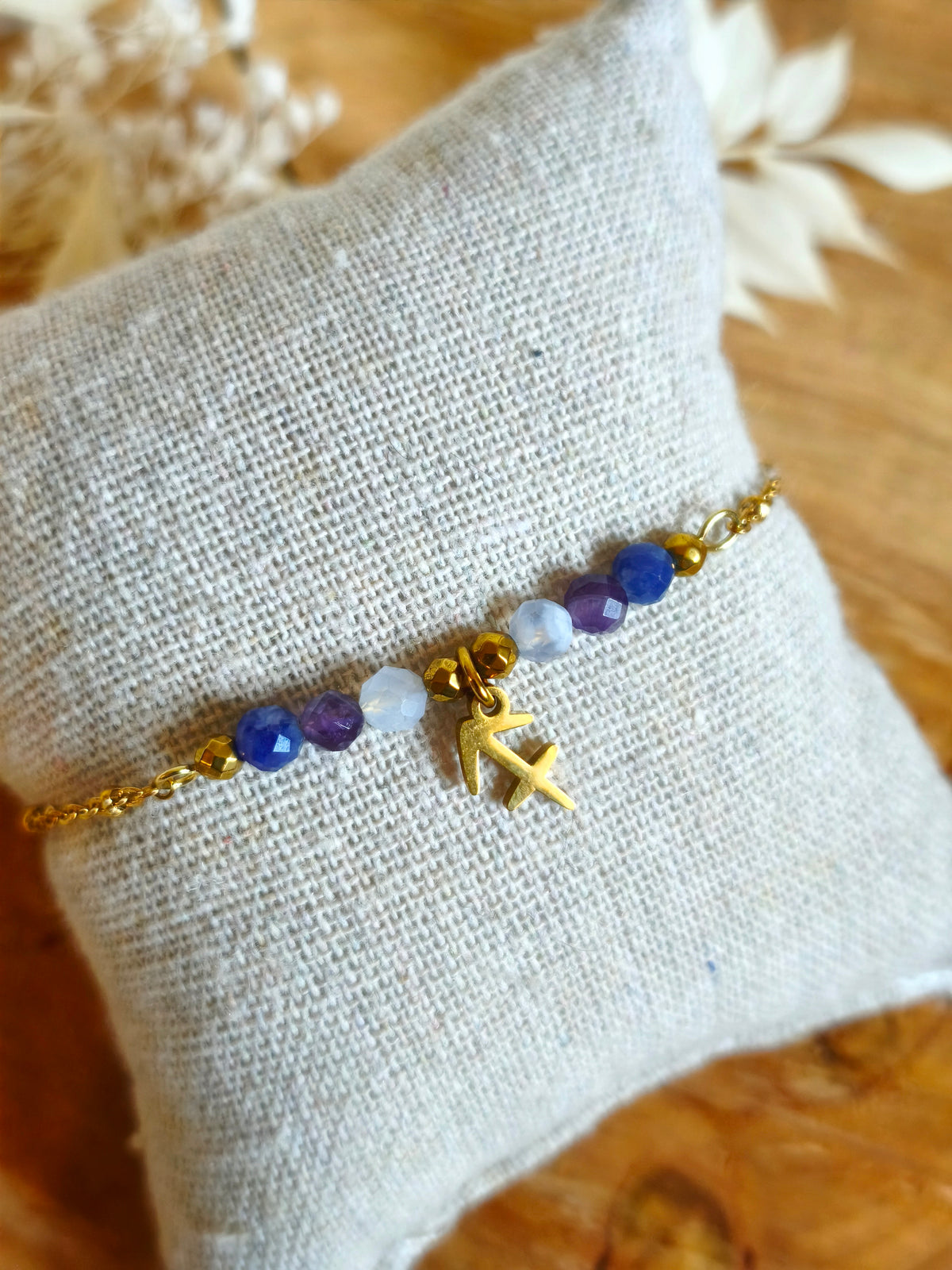 Pour la femme Sagittaire un joli bracelet en acier inoxydable avec ses pierres naturelles