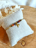Bracelet collection astro pour la femme bélier avec les pierres naturelles de œil de tigre cornaline et grenat sur acier inoxydable doré