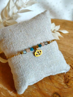 Joli bracelet, collection signe astrologique avec le signe du Cancer et ses pierres fines