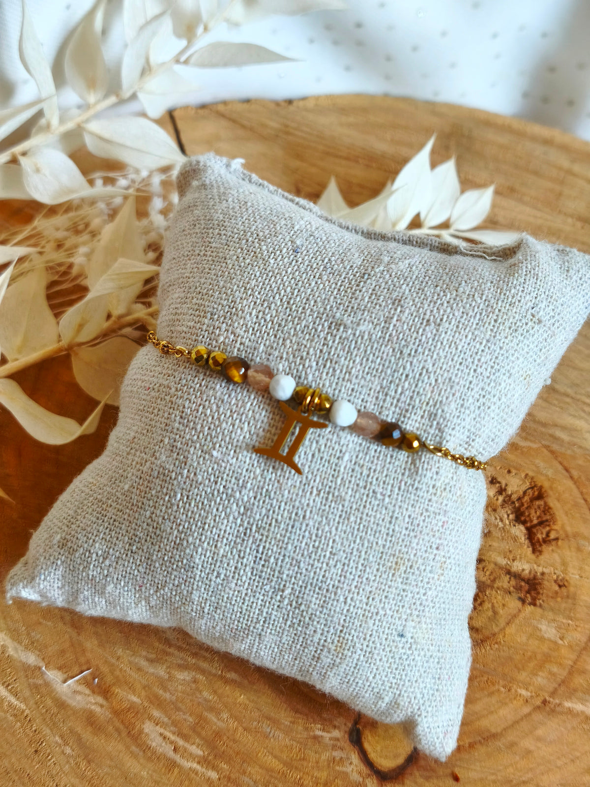 Bijoux sur acier inoxydable doré, collection Astro pour la femme Gémeau.