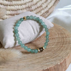 Bracelet en aventurine et cristal de roche fumé sur fil élastique 