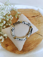 Bracelet super tendance de l'univers de sadlaléane, en tube acrylique dalmatien et pierres fines de quartz fumé
