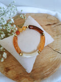 bracelet tubes acrylique orange et marron avec pierres de cornaline